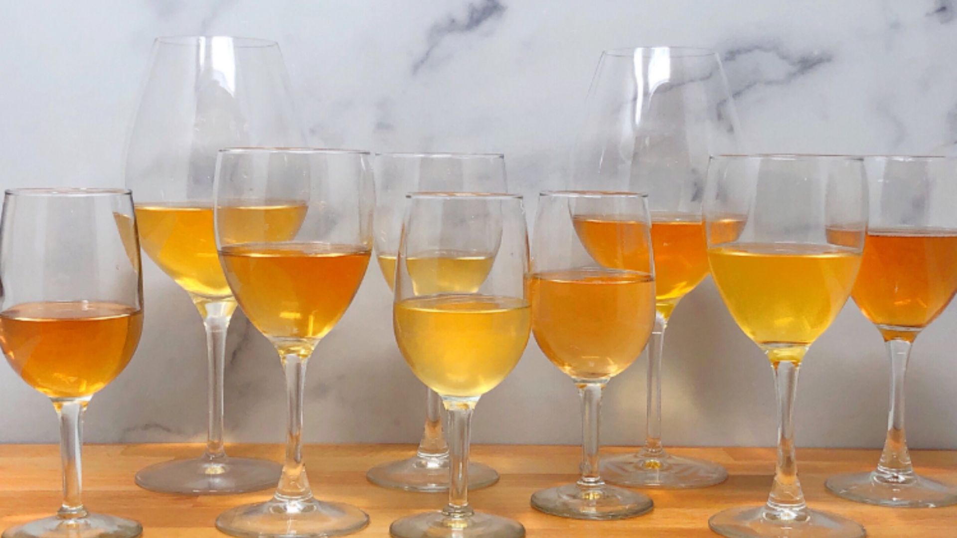 wine glasses with amber wine